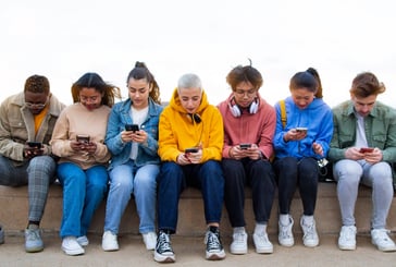 teen on their phones
